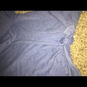 gap shirt with a tie in the bottom in the middle